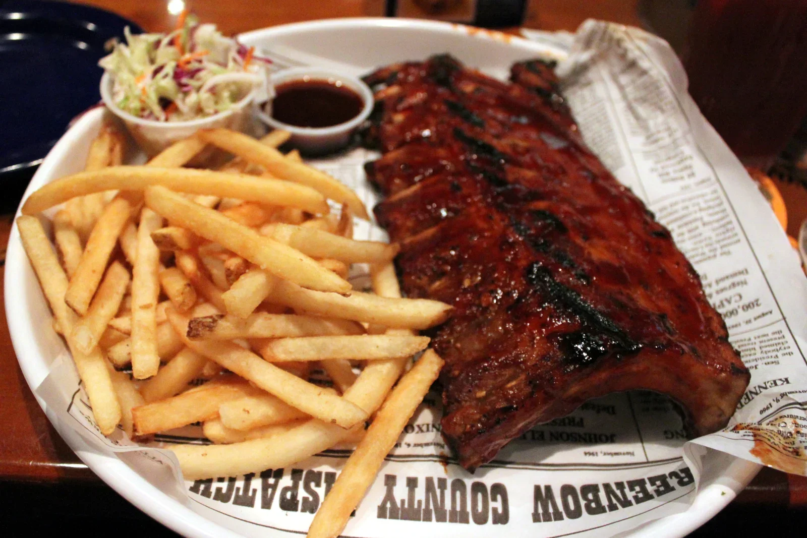Oven-baked baby back ribs with a glossy caramelized barbecue glaze